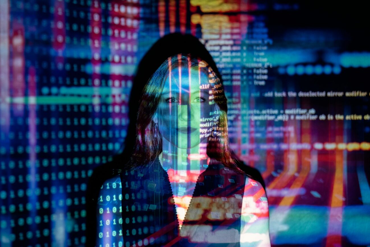 Girl behind data codes picturing explainable AI